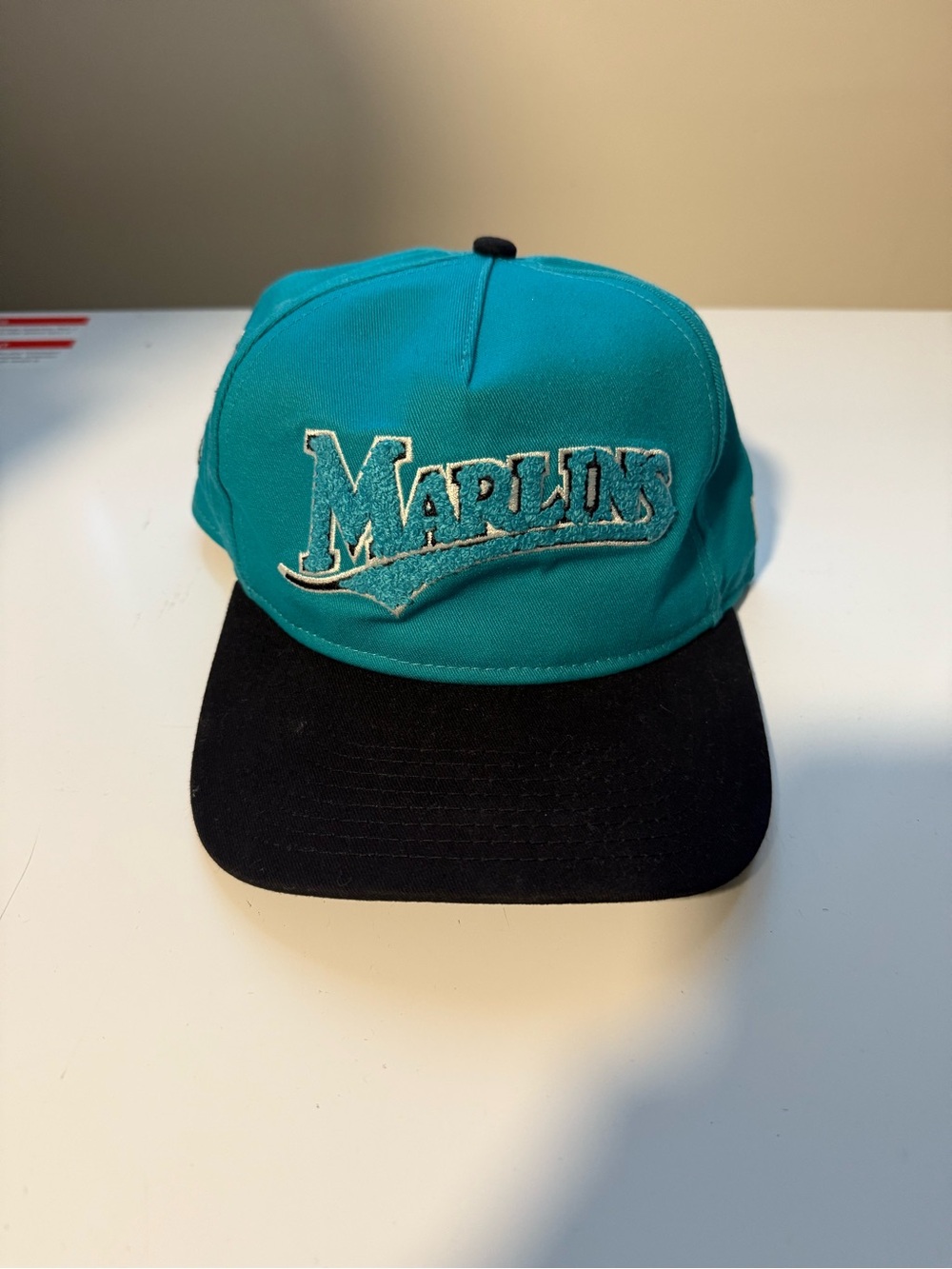 New Era Marlins Teal and Black Snapback Hat